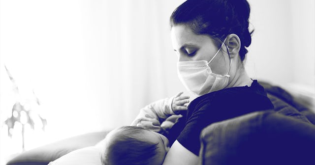 Mother with mask breastfeeding her little baby