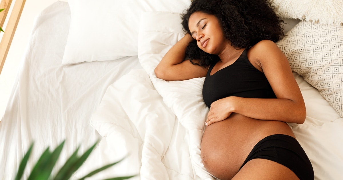 Everything To Know About Pregnancy Sleeping Positions, 'Cause You
