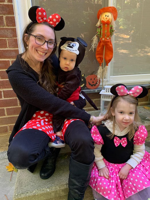 Pamela Addison and her two kids in Mickey Mouse-inspired costumes sitting outside