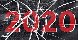 Number 2020 in red with black background smashed into pieces
