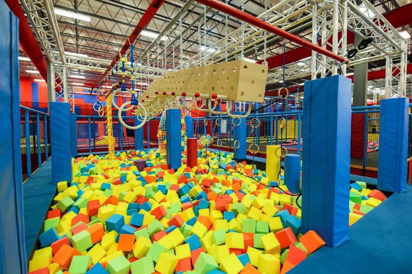 foam pit and hanging bars at planet obstacle indoor amusement park