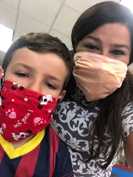 A boy with Type 1 Diabetes and his mom wearing face masks 
