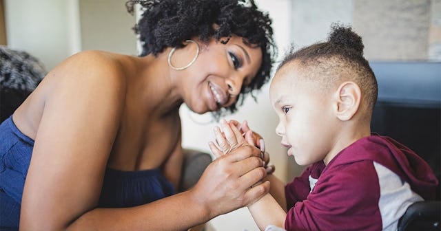 Mom playing with her child that has special needs