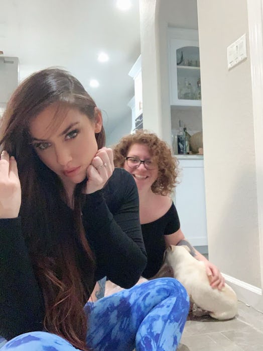 Evelyn Martinez, her twin sister sitt and their cat 