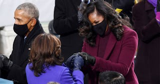  Kamala Harris greeted by former first lady Michelle Obama during the 59th Presidential Inauguration...