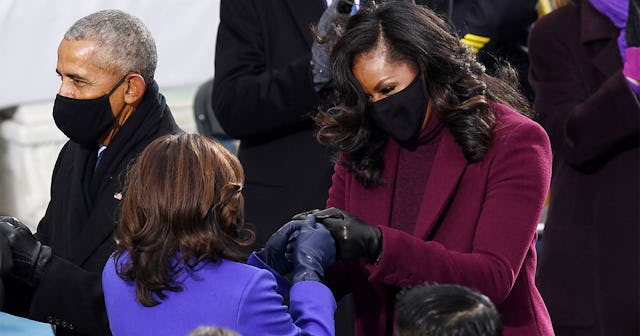 Kamala Harris greeted by former first lady Michelle Obama during the 59th Presidential Inauguration...