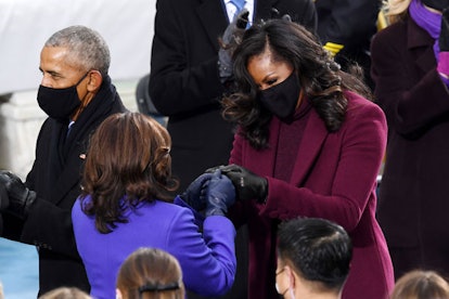  Kamala Harris greeted by former first lady Michelle Obama during the 59th Presidential Inauguration...