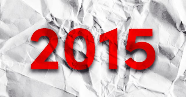 A wrinkled piece of paper with the semi-translucent red number 2015 in the center part