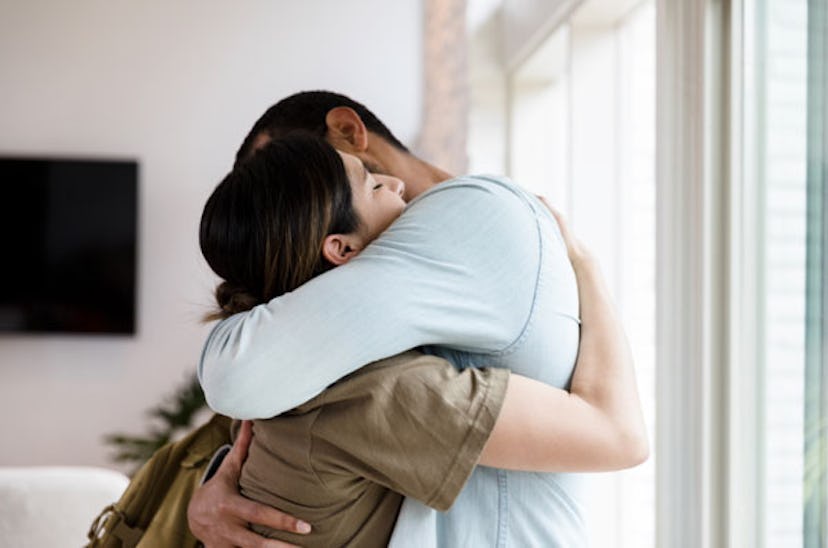 Husband and wife in an emotional hug