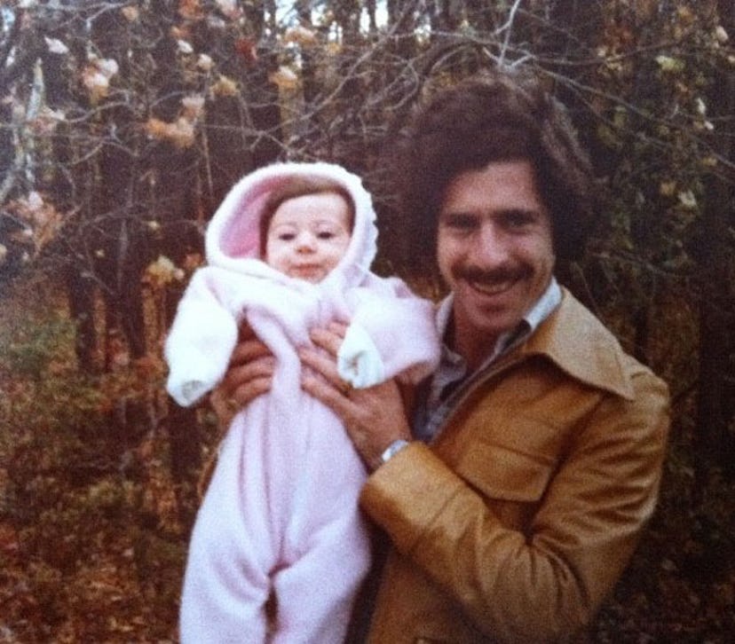 Jaime Schwartz Cohen as a baby being held by her father who has Alzheimer's disease