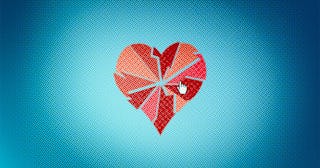 A red heart broken into pieces with a blue background and a cursor on it