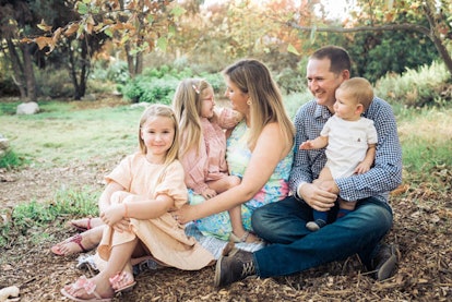 Sara McGlocklin with her husband and three kids, enjoying their time in a park