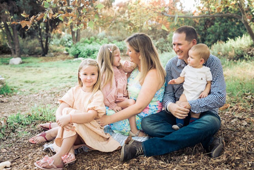 Sara McGlocklin with her husband and three kids, enjoying their time in a park