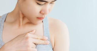 A tween girl checking if she has body hair under her armpits