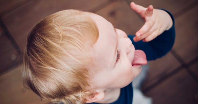 canker sores in babies, blonde baby sticking out tongue