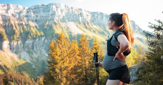 pregnancy dreams, pregnant person on a hike