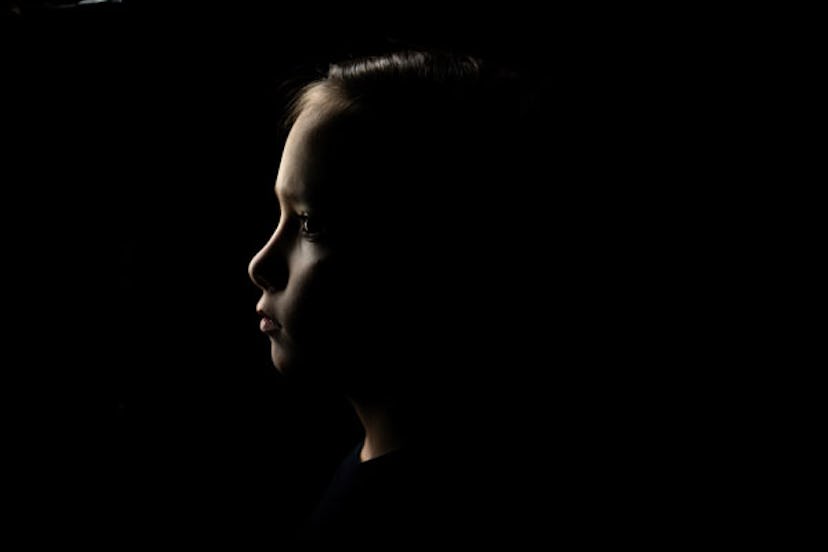 Little girl in dark
