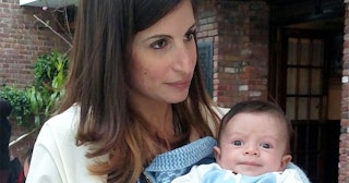 Margaux Calemmo who has experienced postpartum depression holding her baby
