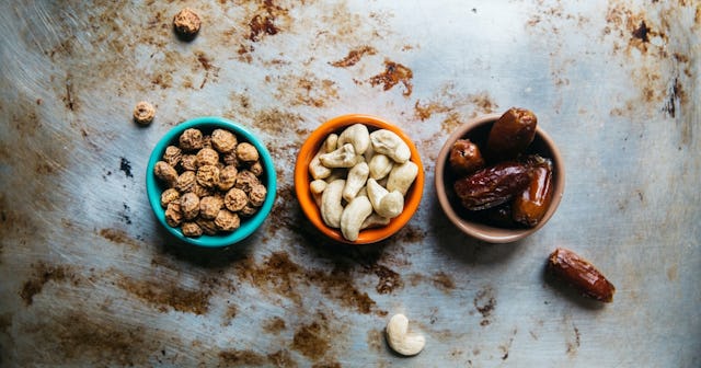healthy late night snacks, three bowls of nuts