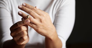 Woman Taking Off Her Wedding Ring