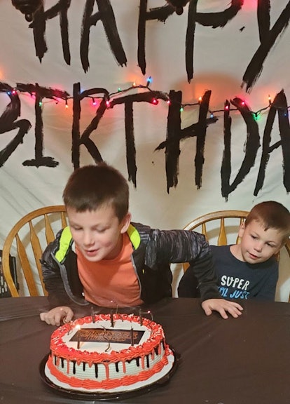 Two Boys With Birthday Cake