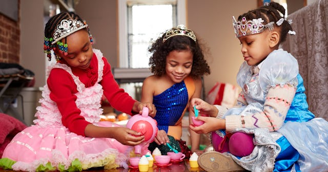 Three girls playing princess tea party