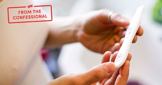 Hands holding a pregnancy test