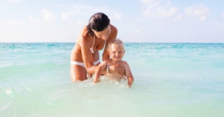 A mom and her toddler in the ocean — names that mean water.