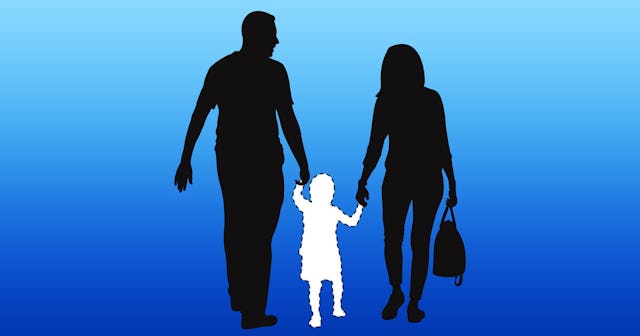 Silhouette of parents going for a walk holding their son between them with a blue background