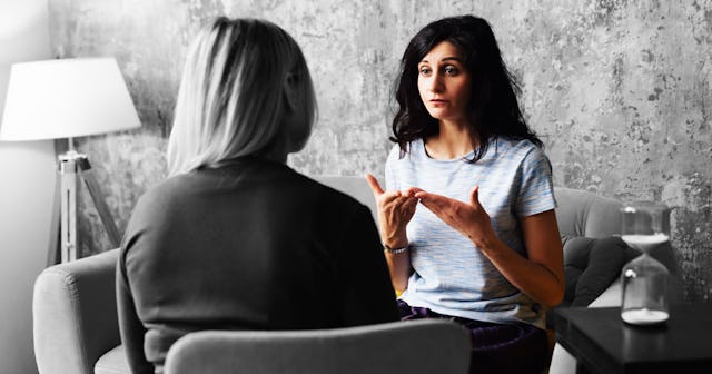 A woman telling another woman she has married the pervert and everything is in black and white excep...