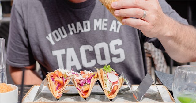 Man eating tacos — taco puns and jokes.