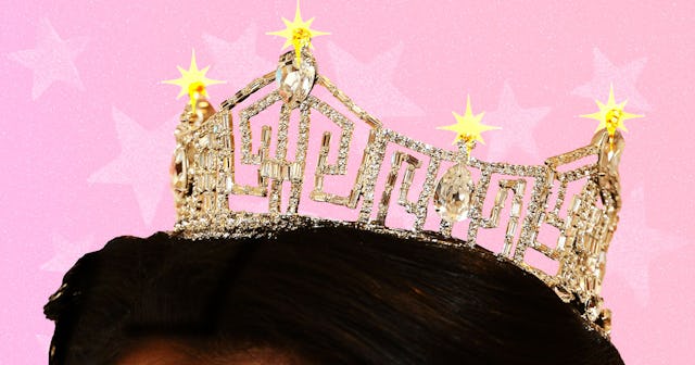 An illustration of the top of a woman's head with a tiara on it