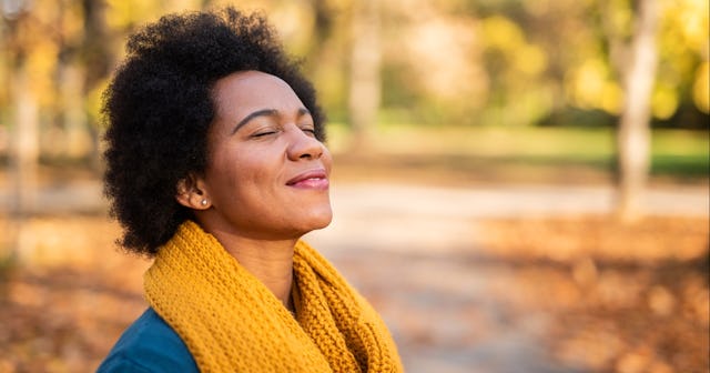 Women enjoying sun on fall day — divine feminine energy
