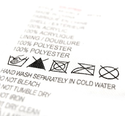 Dry clean tag — laundry symbols.