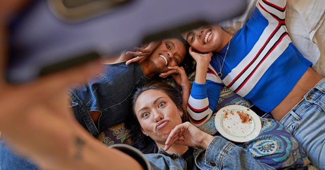 Group of best friends taking a selfie together.