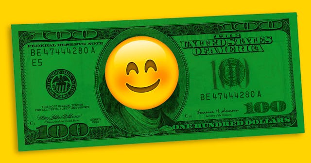 Green one hundred dollar bill with a yellow smiley emoji over it