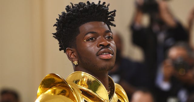 Lil Nas X at the Met Gala in golden armor 