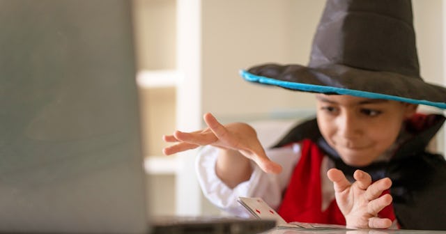 Boy performing magic trick — magic tricks for kids.