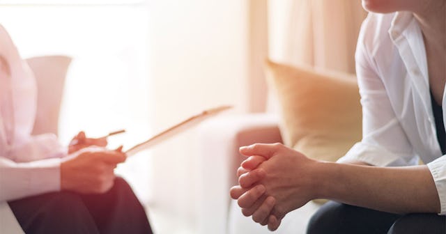 A survivor who is experiencing victim shaming during a session with a therapist