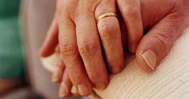 Couple in a 40-Year Marriage holding hands