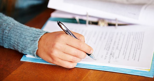 A teacher grading student's exam