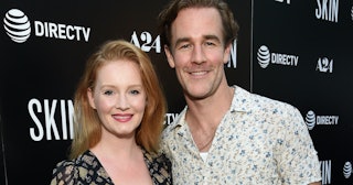 James Van Der Beek and his wife Kimberly Van Der Beek on the red carpet posing and smiling together