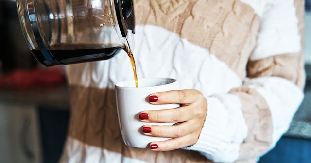 Woman Pouring A Cup Of Coffee Before or After Breakfast