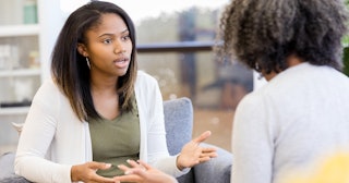 Women in tense conversation — overstepping boundaries