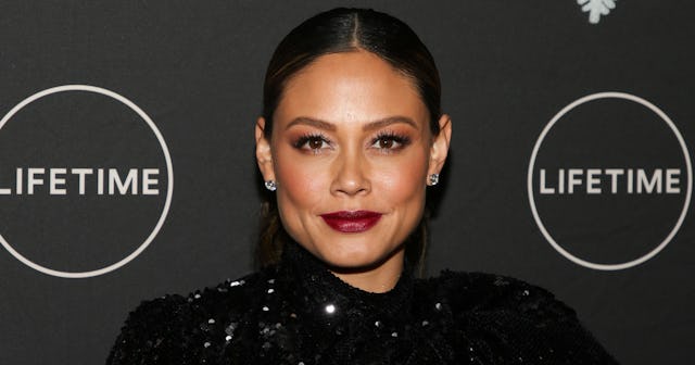 Vanessa Lachey on the red carpet posing and smiling