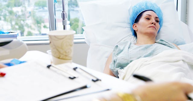 Woman laying in the hospital bed