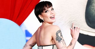 Halsey posing with a smile, overjoyed by her new motherhood 