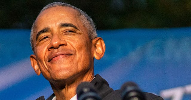 Barack Obama smiling for a photo