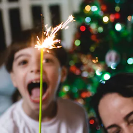 A son and a mother during a family New Year's Eve celebration