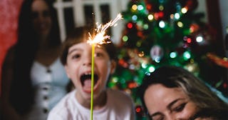 A son and a mother during a family New Year's Eve celebration